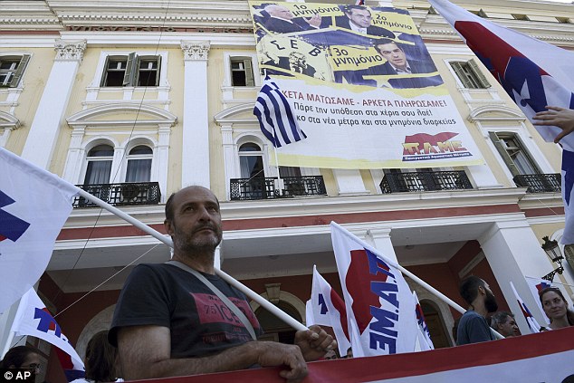 Angry: Greeks have taken to the streets in protest at the terms of the harsh €86 billion bailout agreement