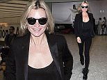 15.JULY.2015  - LONDON  - UK
*** EXCLUSIVE ALL ROUND PICTURES ***
BRITISH SUPERMODEL KATE MOSS IS PICTURED LOOKING CHIC DRESSED HEAD TO TOE IN BLACK AS SHE ARRIVES AT HEATHROW AIRPORT IN LONDON.
BYLINE MUST READ : XPOSUREPHOTOS.COM
***UK CLIENTS - PICTURES CONTAINING CHILDREN PLEASE PIXELATE FACE PRIOR TO PUBLICATION ***
**UK CLIENTS MUST CALL PRIOR TO TV OR ONLINE USAGE PLEASE TELEPHONE  442083442007