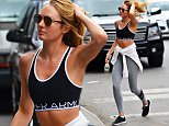 140120, Candice Swanepoel seen out and about in Soho, NYC. New York, New York - Tuesday July 14, 2015. Photograph: © PacificCoastNews. Los Angeles Office: +1 310.822.0419 sales@pacificcoastnews.com FEE MUST BE AGREED PRIOR TO USAGE
