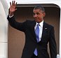 President Barack Obama waves as he arrives at Tinker Air Force Base, Wednesday, July 15, 2015, in Oklahoma City, Okla. (AP Photo/Tyler Drabek)