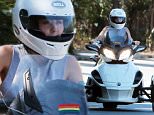Picture Shows: Miley Cyrus  July 16, 2015\n \n Pop star Miley Cyrus is spotted out for a cruise on her three-wheeled motorcycle, a Can-Am Spyder, in Beverly Hills, California.\n \n Non Exclusive\n UK RIGHTS ONLY\n \n Pictures by : FameFlynet UK © 2015\n Tel : +44 (0)20 3551 5049\n Email : info@fameflynet.uk.com