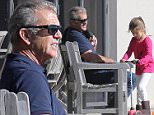 EXCLUSIVE TO INF.\nJuly 15, 2015: Mel Gibson & daughter Lucia Gibson spotted in Sydney hotel pool area, than taking a walk to a Sydney wharf, Sydney, Australia.\nMandatory Credit: INFphoto.com Ref: infausy-12