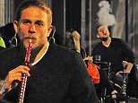 16.JULY.2015  - LONDON  - UK\n*** EXCLUSIVE ALL ROUND PICTURES ***\nSONS OF ANARCHY ACTOR CHARLIE HUNNAM IS SPOTTED OUT AND ABOUT IN LONDON WITH FRIENDS . THE ACTOR WENT UNNOTICED AS HE ENJOYED AN EVENING OUT IN LONDON SMOKING SOME SHEESHA AT A CENTRAL LONDON SHEESH RESTAURANT. THE ACTOR SEEMED TO ENJOY THE SHEESHA BY HIMSELF WITH HIS FRIENDS NOT SEEMING TO SHARE HIS ENTHUSIASM FOR THE SHEESHA PIPE . THE ACTOR WAS SPOTTED COUGHING AT ONE STAGE AND MADE SURE TO GET HIS LAST FEW HITS IN WHILST HIS FRIENDS WAITED FOR HIM .\nBYLINE MUST READ : XPOSUREPHOTOS.COM\n***UK CLIENTS - PICTURES CONTAINING CHILDREN PLEASE PIXELATE FACE PRIOR TO PUBLICATION ***\n**UK CLIENTS MUST CALL PRIOR TO TV OR ONLINE USAGE PLEASE TELEPHONE  442083442007
