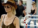 17 Jul 2015 - ROME - ITALY\n*** EXCLUSIVE ALL ROUND PICTURES NOT AVAILABLE FOR ITALY ***\nGERMAN SUPERMODEL HEIDI KLUM AND HER BOYFRIEND PICTURED ARRIVING AT FIUMICINO AIRPORT IN ROME\nBYLINE MUST READ : XPOSUREPHOTOS.COM\n***UK CLIENTS - PICTURES CONTAINING CHILDREN PLEASE PIXELATE FACE PRIOR TO PUBLICATION ***\n**UK CLIENTS MUST CALL PRIOR TO TV OR ONLINE USAGE PLEASE TELEPHONE 44 208 370 0291**
