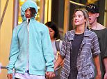 UK CLIENTS MUST CREDIT: AKM-GSI ONLY
EXCLUSIVE: **SHOT ON 7/16/15** New York, NY - Young rapper/actor Jaden Smith seen holding hands with his new girlfriend in NYC. Jaden tried to cover his famous face with a hoodie while his girl kept a shy smile on her face and enjoyed the walk along the streets of the Big Apple.

Pictured: Jaden Smith
Ref: SPL1081740  170715   EXCLUSIVE
Picture by: AKM-GSI / Splash News