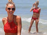 American model Kaitlynn Carter in a red bikini at the beach in Miami Beach, FL. Kaitlynn took a swim in the ocean with her friend Kelsey White.\n\nPictured: Kaitlynn Carter\nRef: SPL1082941  190715  \nPicture by: SplashNews\n\nSplash News and Pictures\nLos Angeles: 310-821-2666\nNew York: 212-619-2666\nLondon: 870-934-2666\nphotodesk@splashnews.com\n