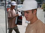 West Hollywood, CA - Singer Justin Bieber goes for a bit of retail therapy in West Hollywood as he was spotted shoe shopping at Shoe Palace.  The sometimes controversial "Where Are You Now" singer recently had his song "Perfect Together" leaked to the general public and sources are saying that the song may be about Selena Gomez. \n  \nAKM-GSI        July 19, 2015\nTo License These Photos, Please Contact :\nSteve Ginsburg\n(310) 505-8447\n(323) 423-9397\nsteve@akmgsi.com\nsales@akmgsi.com\nor\nMaria Buda\n(917) 242-1505\nmbuda@akmgsi.com\nginsburgspalyinc@gmail.com