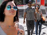 UK CLIENTS MUST CREDIT: AKM-GSI ONLY
EXCLUSIVE: Vancouver, BC - Lovebirds Demi Lovato and Wilmer Valderrama shop in downtown Vancouver together with their pup. Demi teased fans last week by saying she would marry boyfriend Wilmer Valderrama if he asked. But it seems some of Demi Lovato's loyal followers took her a bit literally - prompting the singer to squash rumors of a secret engagement. The 22-year-old singer shared a series of flirty Instagram photos hinting at big news over the weekend but then finally insisted there had been no proposal, saying: 'Not engaged... yall are crazy,'

Pictured: Demi Lovato Wilmer Valderrama
Ref: SPL1083207  190715   EXCLUSIVE
Picture by: AKM-GSI / Splash News