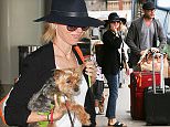 July 20, 2015: Naomi Watts and Liev Schreiber with sons Samuel and Alexander arrive at LAX airport for a departure, Los Angeles, CA.\nMandatory Credit: INFphoto.com Ref.: inf-00