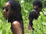 *** UK ONLY *** *** MAIL ONLINE OUT ***140016, NO ORDINARY LOVE! Zoe Kravitz kisses her new boyfriend musician George Lewis Jr AKA Twin Shadow in Miami. The 26 year old, dressed in just a black bikini, was met at her hotel by her new man Twin Shadow. This is the first time the pair have been seen in public as a couple and clearly Zoe was very happy to see him, greeting him with a kiss. Zoe and George have been seen together once before but on a professional level, performing a cover of Sade's 'No Ordinary Love' on 'Late Night with Seth Meyers' back in May with her band Lolawolf.  Miami, Florida - Sunday July 12, 2015.\\n\\nPHOTOGRAPH BY Pacific Coast News / Barcroft Media\\n\\nUK Office, London.\\nT +44 845 370 2233\\nW www.barcroftmedia.com\\n\\nUSA Office, New York City.\\nT +1 212 796 2458\\nW www.barcroftusa.com\\n\\nIndian Office, Delhi.\\nT +91 11 4053 2429\\nW www.barcroftindia.com