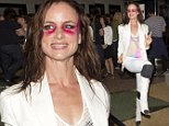 Juliette Lewis in costume wearing bright pink make-up under her eyes and a swim suit under her white suit was seen arriving to do her show at the 'EL Rey Theatre' in Los Angeles, CA\n\nPictured: Juliette Lewis\nRef: SPL1085686  230715  \nPicture by: SPW / Splash News\n\nSplash News and Pictures\nLos Angeles: 310-821-2666\nNew York: 212-619-2666\nLondon: 870-934-2666\nphotodesk@splashnews.com\n