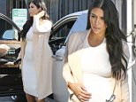 Van Nuys, CA - Kim Kardashian shows her growing baby bump as she arrives at the studio for the family reality show.  Kim chatted with the family bodyguard as she parked her and headed in to get some work done.\n \n AKM-GSI     July 27, 2015\n \n To License These Photos, Please Contact :\n \n Steve Ginsburg\n (310) 505-8447\n (323) 423-9397\n steve@akmgsi.com\n sales@akmgsi.com\n \n or\n \n Maria Buda\n (917) 242-1505\n mbuda@akmgsi.com\n ginsburgspalyinc@gmail.com