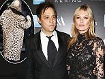 LONDON, ENGLAND - MARCH 12:  Jamie Hince (L) and Kate Moss arrive at the Alexander McQueen: Savage Beauty Fashion Gala at the V&A, presented by American Express and Kering on March 12, 2015 in London, England.  (Photo by David M. Benett/Getty Images for Victoria and Albert Museum)