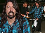 undefined .\nDave Grohl is seen at LAX. \nCredit: BG/GoffPhotos.com   Ref: KGC-300/150727NR3\n**UK, Spain, Italy, China Sales Only**
