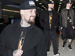 The Madden Brothers arrive in Sydney...The twins were seen smiling as they met up with their old friend and bodyguard Big Alister....Pictured: MADDEN BROTHERS..Ref: SPL1086389  270715  ..Picture by: MAD PEPITO / Splash News....Splash News and Pictures..Los Angeles: 310-821-2666..New York: 212-619-2666..London: 870-934-2666..photodesk@splashnews.com..