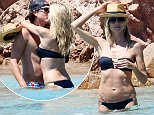27.JULY.2015 - SARDINIA - ITALY\n***EXCLUSIVE PICTURES*** \n*AVAILABLE FOR UK SALE ONLY*\nMODEL HEIDI KLUM SHOWS OFF HER BIKINI BODY WHILE CELEBRATING BOYFRIENDS VITO SCHNABEL BIRTHDAY WHILE ON HOLIDAY IN SARDINIA, THE LOVED UP COUPLE ARE PICTURED ENJOYING EACHOTHERS COMPANY AS THEY TAKE A DIP IN THE CLEAR BLUE SEA AND RELAX ON THE BEACH WITH BEERS!\nBYLINE MUST READ : CIAO PIX/XPOSUREPHOTOS.COM\n***UK CLIENTS - PICTURES CONTAINING CHILDREN PLEASE PIXELATE FACE PRIOR TO PUBLICATION ***\n*UK CLIENTS MUST CALL PRIOR TO TV OR ONLINE USAGE PLEASE TELEPHONE 0208 344 2007**