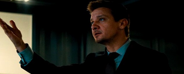 Tense: Tom stars in the movie with Jeremy Renner, whose character William Brandt was tense as they tried to retrieve a mysterious package 