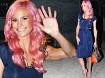 EXCLUSIVE: Real Housewives of Orange County's Meghan King Edmonds shows off her new pink hair after taping Watch What Happens Live this evening in NYC. In support of the recent passing of her husband Jim Edmond's first wife, LeAnn Edmonds Horton, she swung her pink locks back & forth saying "I have pink hair because I care."\n\nPictured: Meghan King Edmonds\nRef: SPL1088794  270715   EXCLUSIVE\nPicture by: Blayze / Splash News\n\nSplash News and Pictures\nLos Angeles: 310-821-2666\nNew York: 212-619-2666\nLondon: 870-934-2666\nphotodesk@splashnews.com\n