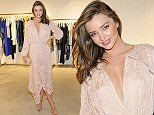 LOS ANGELES, CA - JULY 29:  Model Miranda Kerr attends the opening of the ZIMMERMANN Melrose Place Flagship Store hosted by Nicky and Simone Zimmermann on July 29, 2015 in Los Angeles, California.  (Photo by Donato Sardella/Getty Images for Zimmermann)