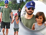 Woodland Hills, CA - Scott Disick takes his son Mason shopping at Target in Woodland Hills, California. Scott walked hand in hand with his boy and even broke a small smile for the cameras as the two walked inside.\nAKM-GSI        July  30, 2015\nTo License These Photos, Please Contact :\nSteve Ginsburg\n(310) 505-8447\n(323) 423-9397\nsteve@akmgsi.com\nsales@akmgsi.com\nor\nMaria Buda\n(917) 242-1505\nmbuda@akmgsi.com\nginsburgspalyinc@gmail.com