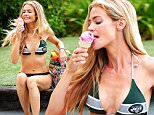 Exclusive - GBP 40 per pic\n Mandatory Credit: Photo by Startraks Photo/REX Shutterstock (4916408o)\n Denise Richards\n Denise Richards, San Diego, America - 28 Jul 2015\n Denise Richards beating the heat with a strawberry ice cream cone at the pool.\n