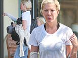 30.JULY.2015 - LOS ANGELES - USA\n*** EXCLUSIVE ALL ROUND PICTURES ***\nTORI SPELLING IS SEEN MAKE UP FREE WITH HER DAUGHTER AS SHE STOPS AT RITE AID PHARMACY BEFORE HEADING TO THE DAILY SPA IN CALABASAS.\nTORI HAS HER ARM IN A BANDAGE AFTER SUFFERING SERVERE BURNS FROM FALLING ON A HOT GRILL IN A RESTAURANT 4 MONTHS AGO.\nBYLINE MUST READ : XPOSUREPHOTOS.COM\n***UK CLIENTS - PICTURES CONTAINING CHILDREN PLEASE PIXELATE FACE PRIOR TO PUBLICATION ***\n**UK CLIENTS MUST CALL PRIOR TO TV OR ONLINE USAGE PLEASE TELEPHONE  44 208 344 2007 ***