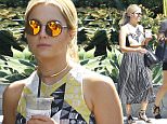 Picture Shows: Ashley Benson  August 01, 2015\n \n Ashley Benson spotted out shopping with a friend in West Hollywood, California. The "Pretty Little Liars" star looked cute and casual in a print cropped top, striped midi skirt, and lace up sandals.\n \n Exclusive All Rounder\n UK RIGHTS ONLY\n \n Pictures by : FameFlynet UK © 2015\n Tel : +44 (0)20 3551 5049\n Email : info@fameflynet.uk.com