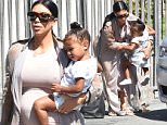 A pregnant Kim Kardashian takes daughter North West to a dance class in Los Angeles\n\nPictured: Kim Kardashian And Daughter North West\nRef: SPL1092516  020815  \nPicture by: Photographer Group / Splash News\n\nSplash News and Pictures\nLos Angeles: 310-821-2666\nNew York: 212-619-2666\nLondon: 870-934-2666\nphotodesk@splashnews.com\n