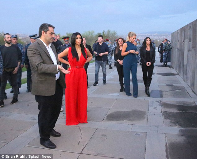 Kim and Khloe walk in the plaza at the Armenian Genocide Memorial. They were accompanied by their cousins Kara and Kourtni and Kim's husband Kanye West. Kim and Khloe's  Armenian heritage comes from their father, the late Robert Kardashian