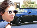 Kendall Jenner drives a vintage black Camaro SS in Beverly Hills, CA. August 4, 2015. X17online.com