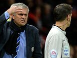 Chelsea manager Jose Mourinho (L) shares his frustration with the assistant referee Gary Beswick (R) after Branislav Ivanovic receives a red card during the English Premier League soccer match between Manchester United and Chelsea at Old Trafford stadium in Manchester on 26 October 2014.  





epa04465131 
EPA/PETER POWELL DataCo terms and conditions apply 
http://www.epa.eu/files/Terms%20and%20Conditions/DataCo_Terms_and_Conditions.pdf