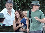 ©2015 RAMEY PHOTO 310-828-3445\nLake Como, Italy \nExclusive\nNo Web usage without agreed fee.\nGeroge Clooney helps Edward Norton and his wife ast they arrive by boat to his Italian home in Lake Como.\n080315\nWIND7
