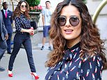 Salma Hayek is all smiles wearing a lipstick shirt while heading out her hotel in NYC\n\nPictured: Salma Hayek\nRef: SPL1094864  060815  \nPicture by: Sharpshooter Images/Splash News\n\nSplash News and Pictures\nLos Angeles: 310-821-2666\nNew York: 212-619-2666\nLondon: 870-934-2666\nphotodesk@splashnews.com\n