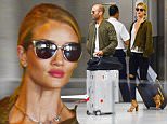 06.AUGUST.2015 - MIAMI - USA\n*EXCLUSIVE ALL ROUND PICTURES*\nPOWER COUPLE JASON STAHAM AND ROSIE HUNTINGTON-WHITELEY ARRIVE AT MIAMI INTERNTAIONAL AIRPORT. ROSIE WORE A LEOPARD PRINT JACKET WITH BLACK RIPPED JEANS AND TAN HEELS AND JASON WORE A KHAKI BOMBER JACKET WITH BLACK JEANS!\nBYLINE MUST READ : XPOSUREPHOTOS.COM\n***UK CLIENTS - PICTURES CONTAINING CHILDREN PLEASE PIXELATE FACE PRIOR TO PUBLICATION ***\n**UK CLIENTS MUST CALL PRIOR TO TV OR ONLINE USAGE PLEASE TELEPHONE 0208 344 2007**