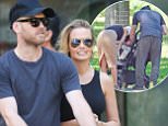 NEW YORK, NY - AUGUST 07:  Sam Worthington and Lara Bingle seen taking their baby boy Rocket for a walk on August 7, 2015 in New York City.  (Photo by Charles Bladen/GC Images)