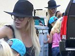 Tori Spelling takes her kids, Stella and Liam to the spa wearing a hat and glasses and taking the back door August 8, 2015  X17online.com