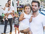 UK CLIENTS MUST CREDIT: AKM-GSI ONLY\nEXCLUSIVE: Calabasas, CA - Scott Disick continues to hit the campaign trail, hoping for a last minute victory over a very hot looking Kourtney Kardashian.  Scott appears to be doing everything possible to be the family man Kourtney  seeks, taking the kids out to dinner, not drinking, and even slightly smiling for the paparazzi!  Scott took Mason and Penelope out for pizza at Fresh Brothers in Los Angeles.  Mason sporting a "We will rock you!" campaign tee, red shorts, and leg tattoos.\n\nPictured: Scott Disick, Mason Dash Disick and Penelope Disick\nRef: SPL1097985  070815   EXCLUSIVE\nPicture by: AKM-GSI\n\n