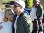 Celebrity Apprentice stars Sophie Monk and Matt Cooper could not keep their hands off each other during a break..between filming scenes for the Channel 9 show...