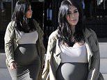 Picture Shows: Kim Kardashian  August 10, 2015\n \n Pregnant Kim Kardashian spotted out shopping at Barneys New York in Beverly Hills, California. The reality star was showing off her baby bump in a form fitting ensemble.\n \n Non Exclusive\n UK RIGHTS ONLY\n \n Pictures by : FameFlynet UK © 2015\n Tel : +44 (0)20 3551 5049\n Email : info@fameflynet.uk.com