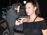 West Hollywood, CA - Bella Hadid and her boyfriend The Weeknd (Abel Tesfaye) arrive for a low-key dinner date at The Nice Guy in West Hollywood. The 18-year-old model wore a sheer black top, black leggings, a grey sweater tied around the waist and a pair of black Louboutin boots. The camera shy Canadian singer covered his face as he dashed inside the celebrity hotspot.\nAKM-GSI          August 11, 2015\nTo License These Photos, Please Contact :\nSteve Ginsburg\n(310) 505-8447\n(323) 423-9397\nsteve@akmgsi.com\nsales@akmgsi.com\nor\nMaria Buda\n(917) 242-1505\nmbuda@akmgsi.com\nginsburgspalyinc@gmail.com
