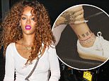 New York, NY - While out on a tattoo parlor run, pop star Rihanna looked flawless once again, adding some color to her pretty tan wearing bright purple lipstick and matching her tons of pink in comfy sweats.\nAKM-GSI          August 12, 2015\nTo License These Photos, Please Contact :\nSteve Ginsburg\n(310) 505-8447\n(323) 423-9397\nsteve@akmgsi.com\nsales@akmgsi.com\nor\nMaria Buda\n(917) 242-1505\nmbuda@akmgsi.com\nginsburgspalyinc@gmail.com