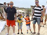 PLEASE CALL INF NYC DIRECTLY FOR USAGE at 212-582-0066 OR 917-496-6766
August 13, 2015: Elton John and David Furnish with their kids Zachary and Elijah arriving at Club 55 restaurant in Pamplona Beach, Saint-Tropez, France.
Mandatory Credit: INFphoto.com Ref.: inffr-09/PAP08151248