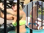 UK CLIENTS MUST CREDIT: AKM-GSI ONLY\nEXCLUSIVE: **SHOT 8/10/15** Studio City, CA - Actress Amanda Bynes cools down on a hot summer day as she makes a splash in her community pool with a few friends.  The comedian seems to have no care in the world as she is spotted taking selfies of herself while submerged in the water. The petite beauty wore a mismatched two-piece and accessorized with a pair of sunglasses while tucking her hair into a trucker hat. Amanda Bynes has laid low for a few months after being hospitalized and put on a psychiatric hold in 2014 regarding mental health issues.\n\nPictured: Amanda Bynes\nRef: SPL1101013  120815   EXCLUSIVE\nPicture by: AKM-GSI / Splash News\n\n