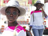 EXCLUSIVE: Lupita Nyong'o seen grabbing lunch with friends in SoHo, New York City.\n\nPictured: Lupita Nyong'o\nRef: SPL1101779  130815   EXCLUSIVE\nPicture by: Splash News\n\nSplash News and Pictures\nLos Angeles: 310-821-2666\nNew York: 212-619-2666\nLondon: 870-934-2666\nphotodesk@splashnews.com\n