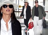 Michael Douglas with wife Catherine Zeta Jones and kids Dylan and Carys arrive at JFK airport in NYC.\n\nRef: SPL1103511  160815  \nPicture by: Ron Asadorian /Splash News\n\nSplash News and Pictures\nLos Angeles: 310-821-2666\nNew York: 212-619-2666\nLondon: 870-934-2666\nphotodesk@splashnews.com\n