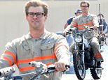 Exclusive... 51825826 Actor Chris Hemsworth wears his Ghostbusters uniform as he rides a motorcycle on the set of "Ghostbusters" on August 17, 2015 in Boston, Massachusetts. FameFlynet, Inc - Beverly Hills, CA, USA - +1 (818) 307-4813