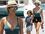 The Kardashian-Jenner clan enjoy their family getaway as they spend the afternoon boating around Saint Barthelemy. August 18, 2015 X17online.com