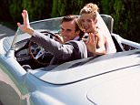 Newlyweds in sports car - Couple who have just married drive off in a sports car, happy and  waving.
landscape colour lifestyle 
adult
adults
bridegroom
bride
driving
marriage
waving
Caucasian
Caucasians
convertible
couple
female
IS555
IS555
057
leaving
looking
at
camera
male
man
newlywed
newlyweds
outdoors
sitting
smiling
sports
car
two
people
wedding
woman
BRIDE
DRIVING
MOTOR CARS
POSED BY MODELS
ROMANCE
SPORTS CARS
WAVING
WEDDINGS