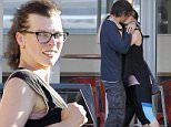 Exclusive FOR MOL\n Mandatory Credit: Photo by Tania Coetzee/REX Shutterstock (4989060b)\n Milla Jovovich and Paul W.S. Anderson\n Milla Jovovich out and about, Cape Town, South Africa - 21 Aug 2015\n Keeping up the fitness program, Milla Jovovich and Paul Anderson enjoyed another workout session on Friday. The couple looked exhausted after a strenuous workout of climbing mountains, gym work and dance classes. After training, the couple recharged their energy with a quick caffeine stop at a nearby coffee shop, where  Milla wasted no time in lighting up a cigarette. The coffee stop seemed to have worked as they were spotted in a tight embrace before heading home. Jovovich has started preparing for her role and has already been undergoing fight rehearsals with her stunt team. Shooting will start in September on "Resident Evil: The Final Chapter".\n