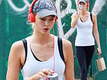 141495, Karlie Kloss, wearing a gym outfit, seen out and about in SoHo, NYC. New York, New York - Sunday August 23, 2015. Photograph: © PacificCoastNews. Los Angeles Office: +1 310.822.0419 sales@pacificcoastnews.com FEE MUST BE AGREED PRIOR TO USAGE